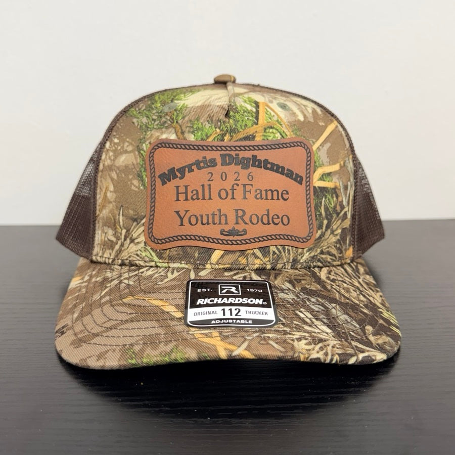 Myrtis Dightman Richardson 112 Realtree MAX-1 camouflage cap with brown patch, front view
