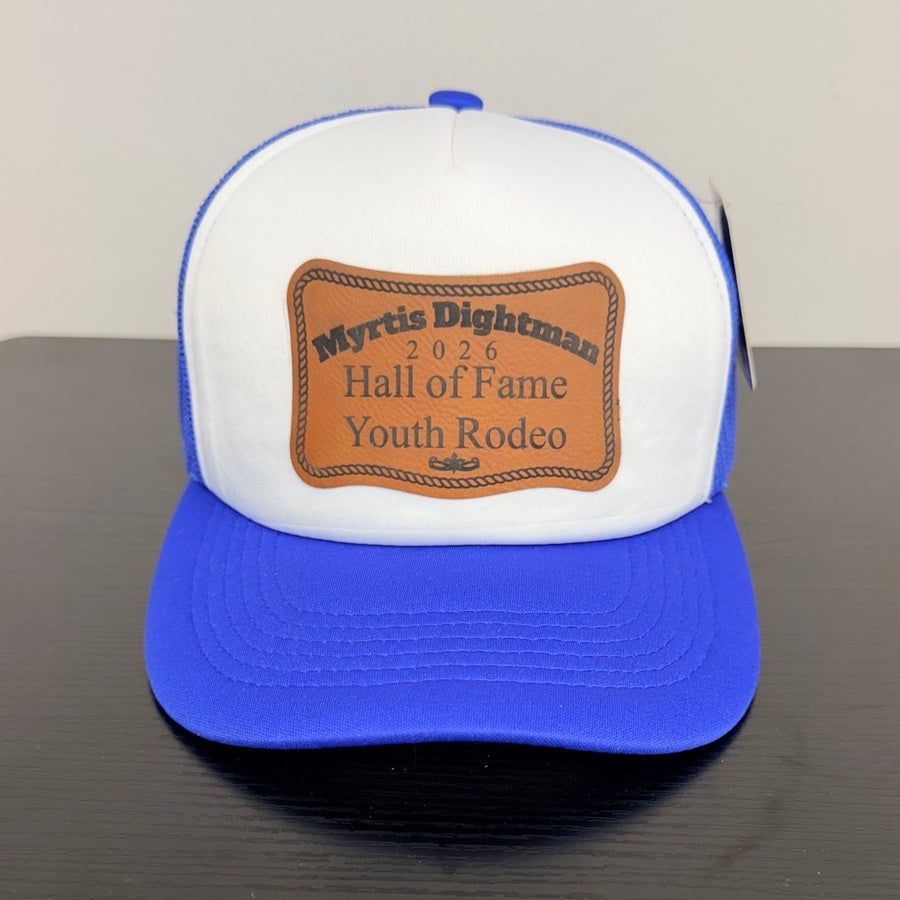 Myrtis Dightman Cambridge white and royal blue cap, front view of actual cap